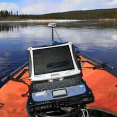 Research laptop on a floating measuring station in a river environment