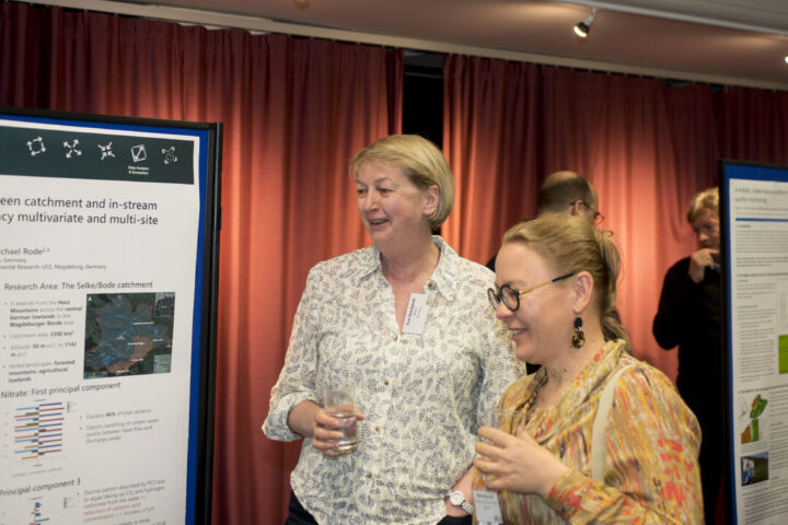 Maria Kämäri & Eva Skarbøvik, NIBIO, Norway, looking at Eva's poster on”Sensors for stakeholders?” from NORDBALT ECOSAFE: Nitrogen and phosphorus load reduction approach within safe ecological boundaries for the Nordic Baltic region - Nibio, where Syke is also a partner. Photo credit: Paul Glendell